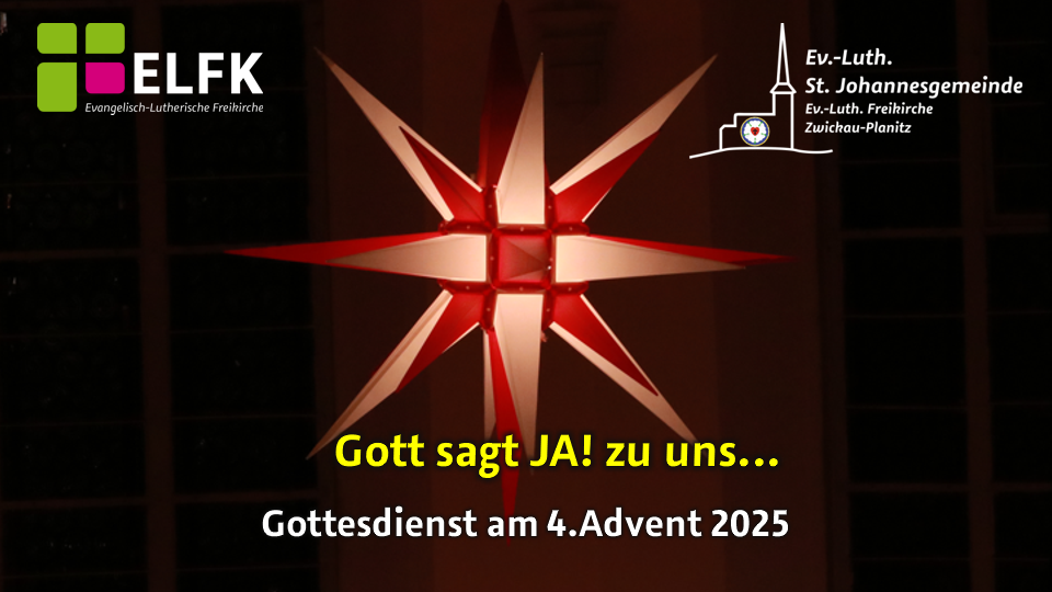 ein leuchtender Adventsstern vor dunklem Hintergrund